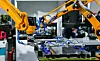 Robot arm control the Steel sheet cutting process in the industrial factory