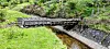 This wooden gutter carries water from a mountain stream over one on the leats
