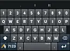 Swype's main keyboard, showing symbols in smaller, fainter text
