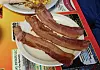 American bacon cured with AR-15 assault rifle