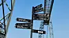 A signpost points the way to the other existing transporter bridges