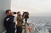 Two Royal Navy ratings with an Aldis lamp on HMS Enterprise