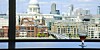 London skyline, beer on windowsill