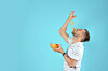 man pours chips on face