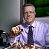NASA's Mike Krainak with the silicon-photonic chip