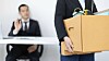 employee waves goodbye to laid off colleague