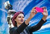 Someone taking a selfie with a 5G mast