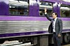 Suit waves goodbye to train