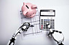 A robot adding up its finances