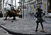 Statue of girl confronting Wall Street bull