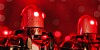 Bad-looking robots glowing red with red eyes