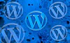 Collection of WordPress logos over some ink in water