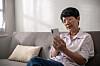 woman looks at cellphone