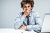 Surprised man computer photo via Shutterstock