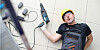 attempting a fix, man falls down stairs with drill in his hand