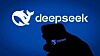 The DeepSeek logo on a wall and on a phone