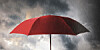 Umbrella under clouds