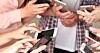 Young 'creatives' whip out their mobile phones. Photo by Shutterstock