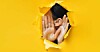 Someone listening through a hole ripped in a paper wall