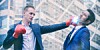 Men in suits boxing