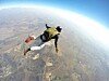 Parachutist image via Shutterstock