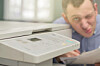 User destroyed a printer by trying to fix a paper jam