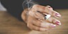 Hand holding a cigarette
