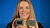 Intel exec Lisa Spelman holds up some fifth-gen Xeon processors