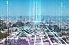 Illustration of a city covered in lines of binary indicating interconnected devices