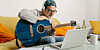 playing guitar on a zoom call