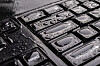 A keyboard covered with water