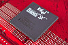 An Intel 486 (80486) SX processor on a red motherboard