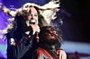 Ozzy Osbourne performing live with his bassist Blasko in 2013. Photo by Harmony Gerber,  Creative Commons Attribution 2.0 Generic