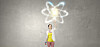 Illustration of someone reaching up to touch a symbol of an atom