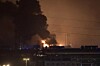 Smoke and fire are seen after an explosion in the Binhai New Area in north China's Tianjin Municipality on Aug. 13, 2015. An explosion rocked the Binhai New Area in north China's Tianjin Municipality at around 11:30 p.m. Wednesday. The cause and casualties are not immediately known. (Xinhua/Yue Yuewei)