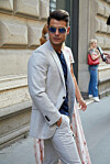 Model Frank Gallucci wears Ray Ban sunglasses during Milan Fashion Week