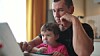 Father and baby using computer