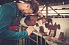 a young farmer and a calf...