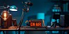 radio studio with massive microphone and On Air sign