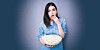 A woman eating popcorn in shock