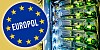 Generic illustration of the Europol logo next to some network equipment