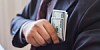 Tucking cash into suit pocket - a hint of corruption?