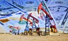 American oil drills set in front of $100 bills