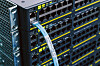 Close up of a rack of Cisco networking equipment