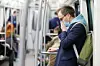 coronovirus: man covers face on public transport