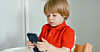 Kid on a phone