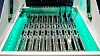 2CRSi servers submerged in a Midas immersion cooling tank on display at SC22