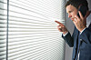 a mobile user looking suspicious from Shutterstock