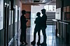 coworkers in the hallway