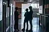 coworkers in the hallway